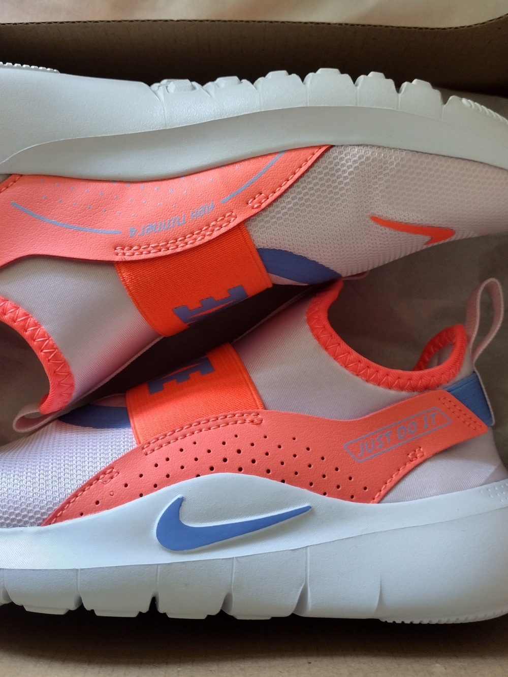 Nike Kids Slip-On Sneakers in White, Coral, Lavender